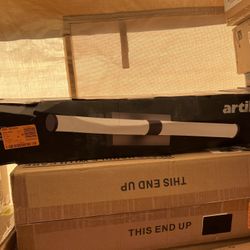 Lithonia Lighting Contractor Select CNY 10-in Gloss Bronze Outdoor Integrated LED Flush Mount Light with Motion Sensor