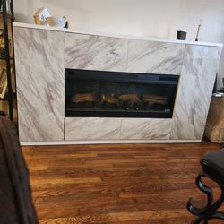 Fire Place  White Marble-with hidden storage.