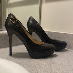 GUESS black 4” heels with a buckle accent on the side, very good condition, in a Women’s size 9