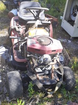 Lawn mower as is (might run or parts)