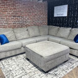 Free Delivery Ashley gray 3pc L shape sectional w storage ottoman