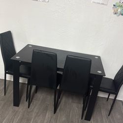 Black table 4 chairs