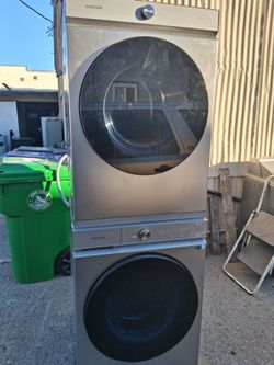 Stackable washer and dryer brand Samsung electric dryer everything is and excellent conditions 3 months warranty