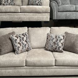 Sofa with pillows brand new Ashley furniture