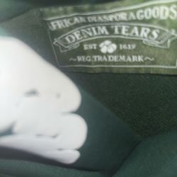 Green denim tear