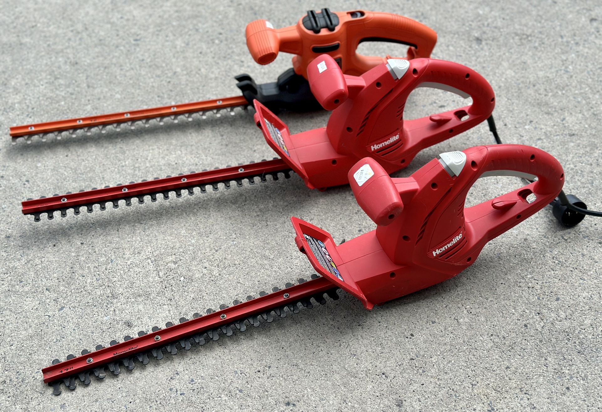 Homelite and Black + Decker Electric Hedge Trimmers - $15 a piece