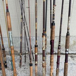 Lot of vintage and antique fishing rods. Perfect for man cave or