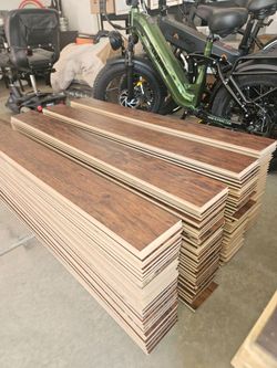 300ft Of Beautiful 12mm brown laminate floors