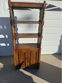 I am selling this real in my solid wood bookshelf with doors