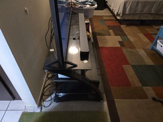 Glass and metal TV stand - free