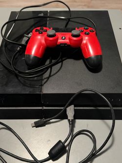PS4 with controller OBO
