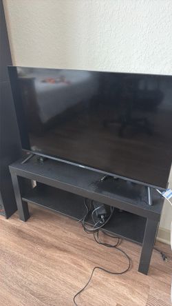 40" 1080p smart TV and TV stand