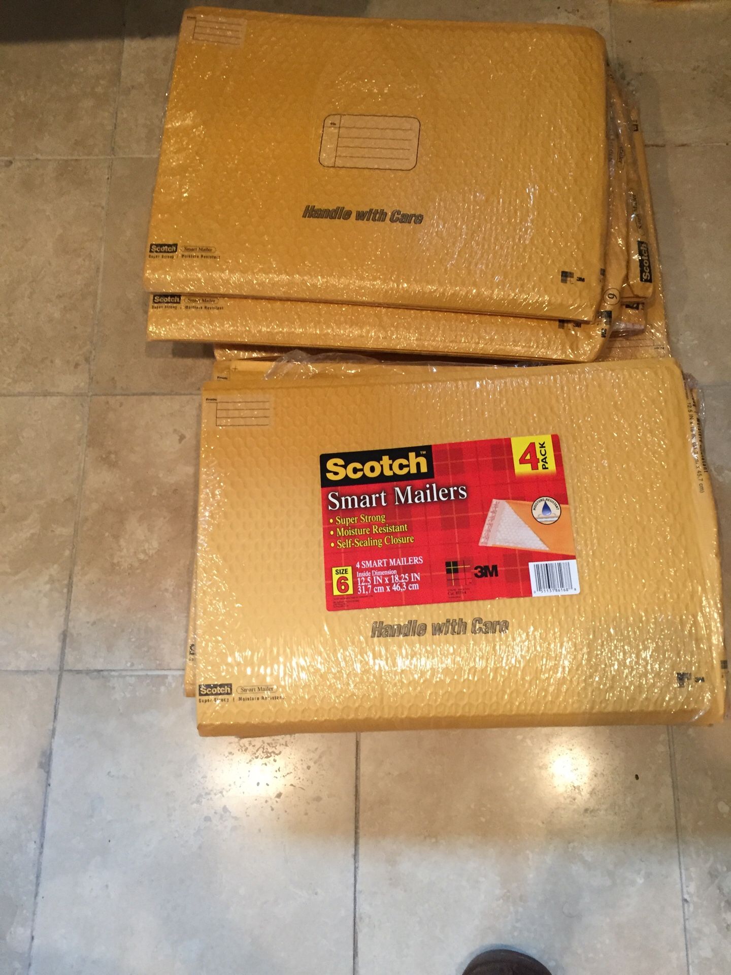 Yellow envelopes and scotch smart mailers