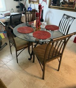 Just table and four chairs not the table decorations