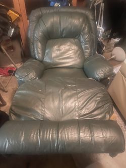 Green Leather Recliner in fair condition