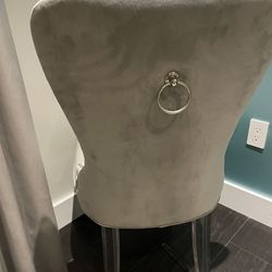 Two grey chairs 