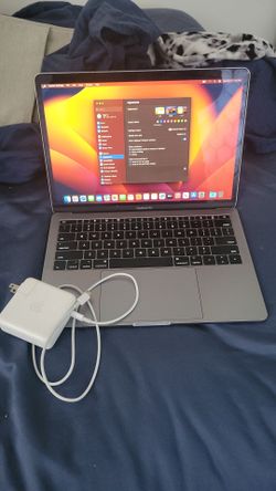MacBook pro 2017 8GB ram 120 GB hard drive with charger delivery available has some scratches and a small dent does not affect screen or keyboard ever