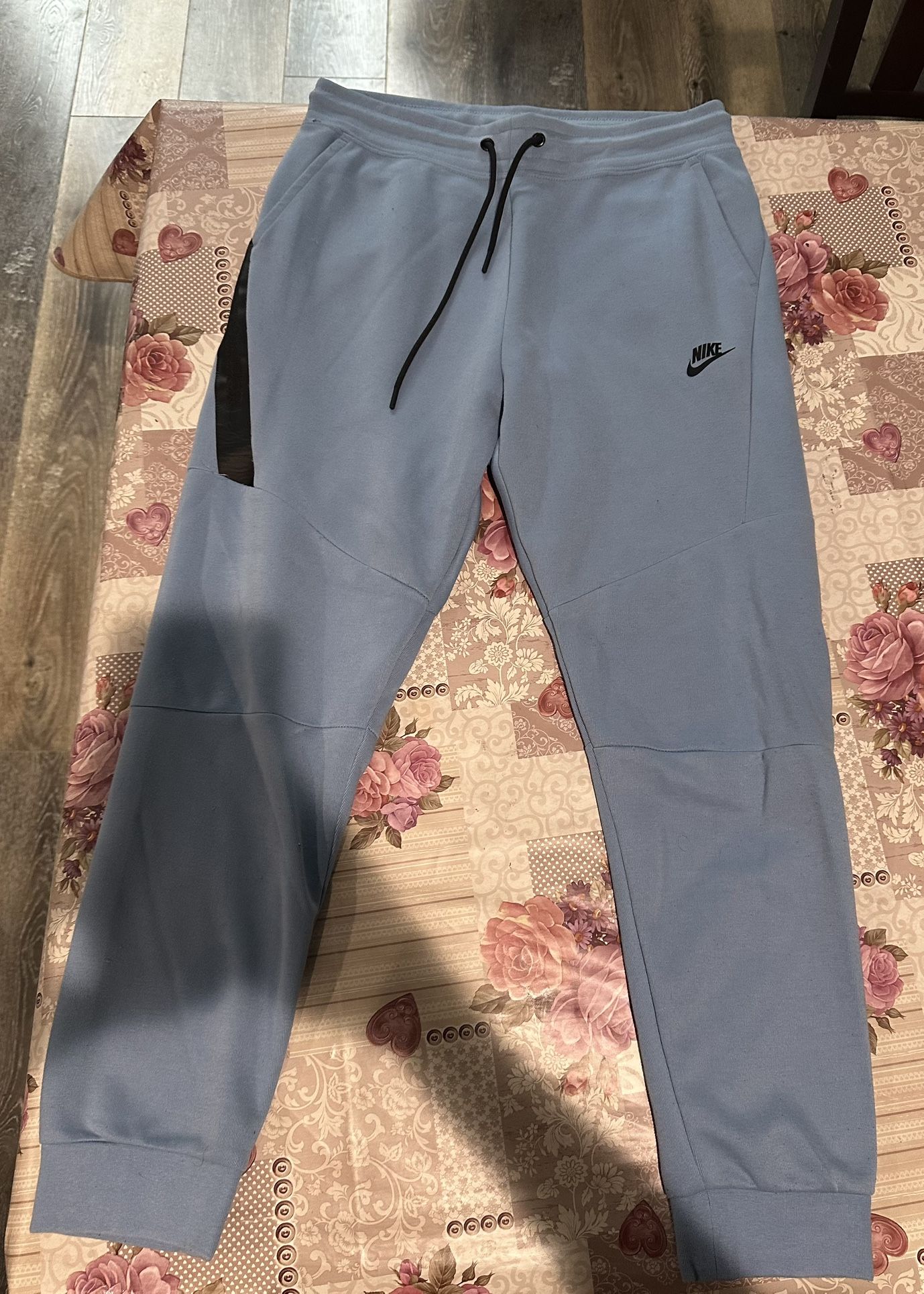 Blue Nike Tech Pants