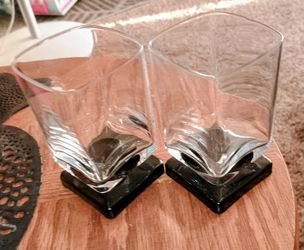 A Pair Of Vintage Drink Glasses With Black Square Stems