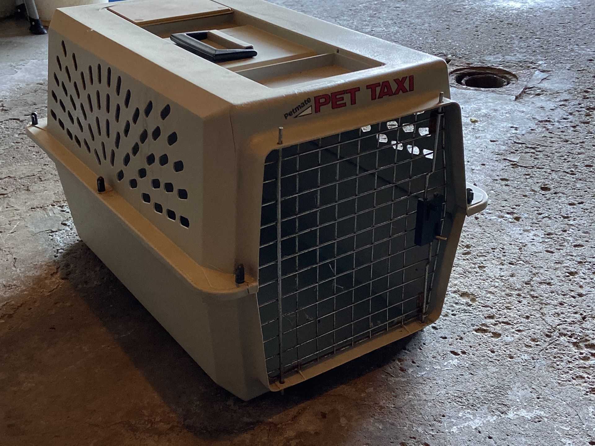 Petmate pet taxi crate (2 foot long x 1 foot wide)