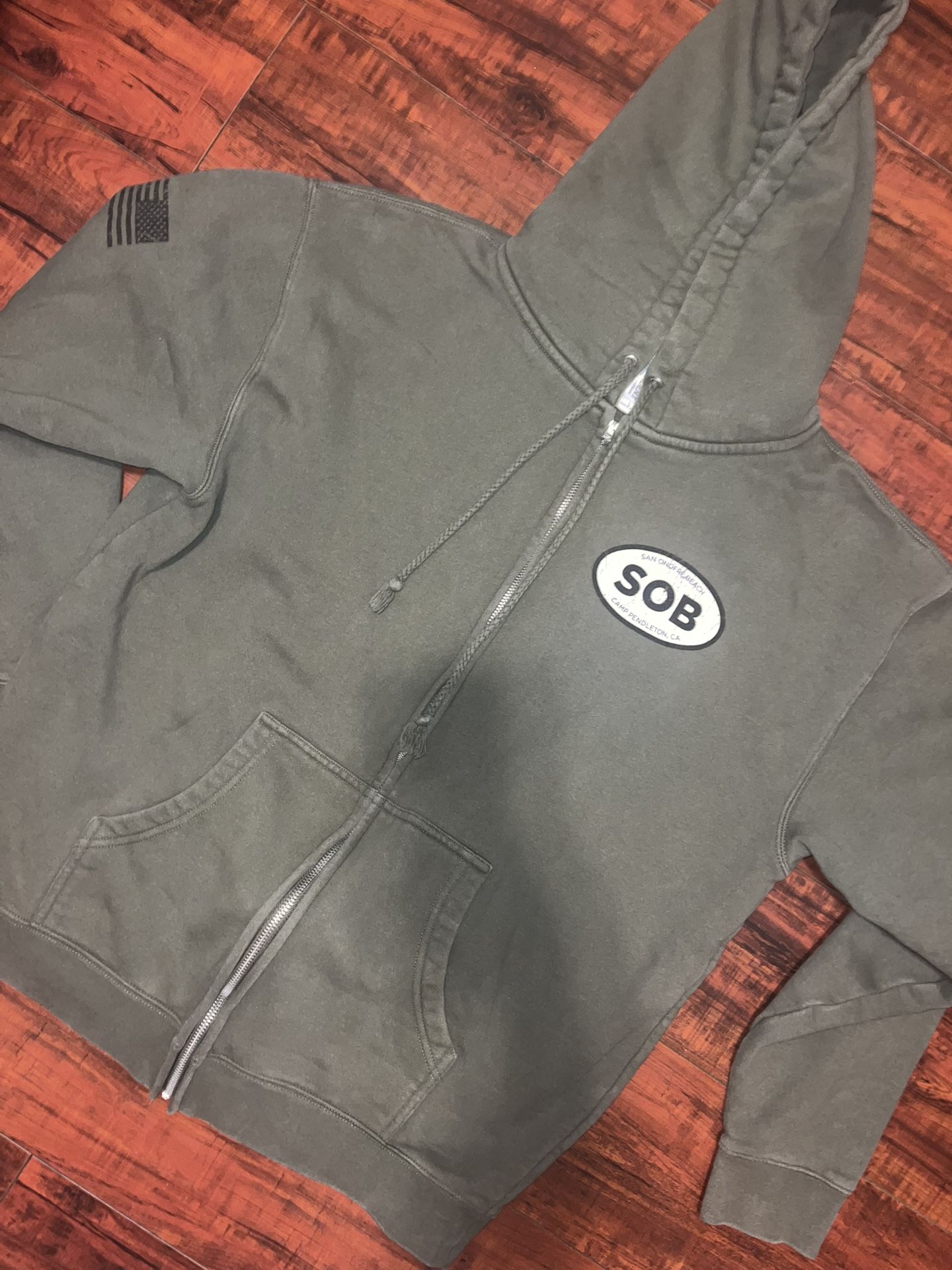 Medium SOB Green Zip Up $20