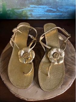 Woman’s Tory Buch golden leathers sandals