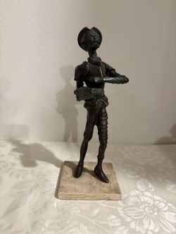 vintage Metal  Don Quixote sculpture.