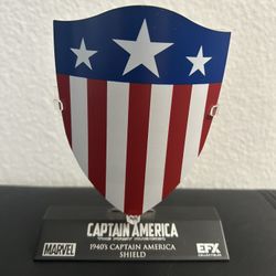Captain America shield. Wolverine figurine & Daredevil business cards