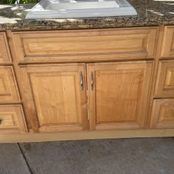 60β vanity with free granite countertop, sink and faucet.