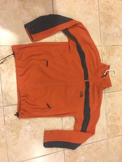 North face jacket. Size L/G . Beautiful orange and Gray color . Very clean.