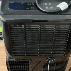 Selling portable AC unit used but brand new