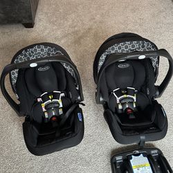 Two Graco Snugride Snugfit 35 LX car seats and 4 bases