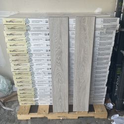 TrafficMaster Camden Lake Oak 7 mm Laminate Wood Flooring (23.90/SQFT)