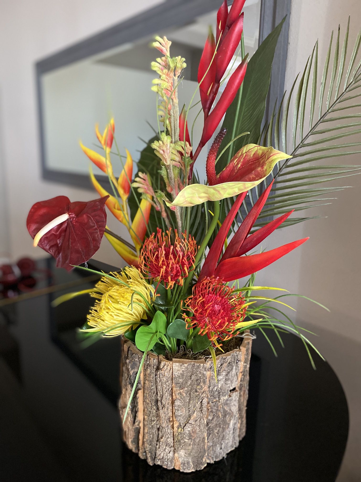 Beautiful Custom Made Tropical Silk Arrangement Nested In Natural Bark Tree Stump. Bring Any Room To Life With Yellow And Bright Reds