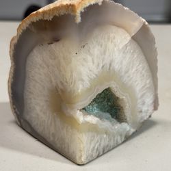 Agate crystal measuring approximately 4” tall. Could be used as a desktop pen holder or candle holder! 