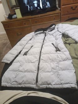 Andrew mark stretch girls long style designer coat. Light grey and black like New very lightly used $35.00  New $75.00.