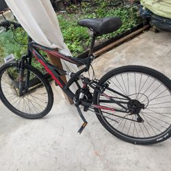 Hyper Shocker mountain bike with 26 inch wheels.