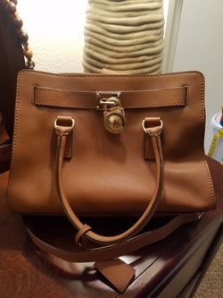 MK tan purse