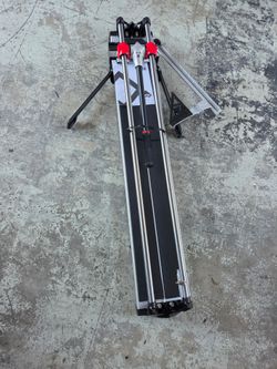 New Rubi Speed Magnet 36 in. Tile Cutter with Tungsten Carbide cutting wheel! Retails $470 with Taxes!