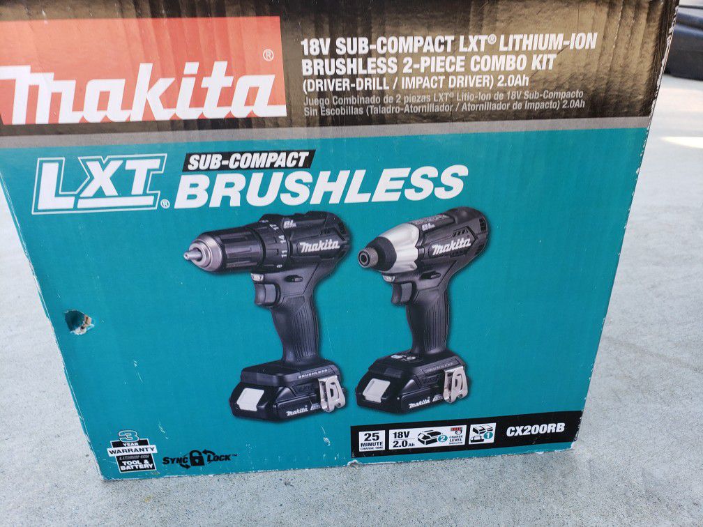 MAKITA 18V LXT SUB COMPACT BRUSHLESS DRILL AND IMPACT 2 BATTERIES AND1 CHARGER NEW NEVER USED