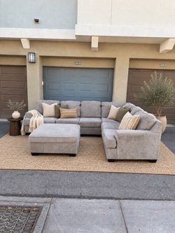 Ashley Bovarian Sectional + Storage Ottoman