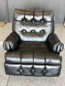 Vintage Black leather truffled swivel rocking chair.  Low Profile.