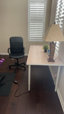 table with chair and table lamp