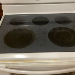 Glass top white electric stove 
