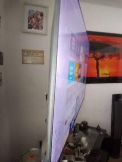 65" TCL Roku Smart tv & glass stand