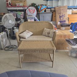 Wicker Love seat and Table. 