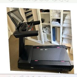 face win Sunny Health & Fitness Treadmill Exercise at Home