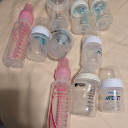 Like New 10 Baby Bottles ( Only Used 1 Time ).