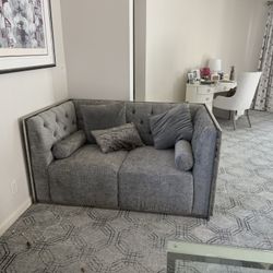 Two Love Seats And A Table