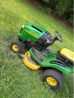 John Deere riding lawnmower